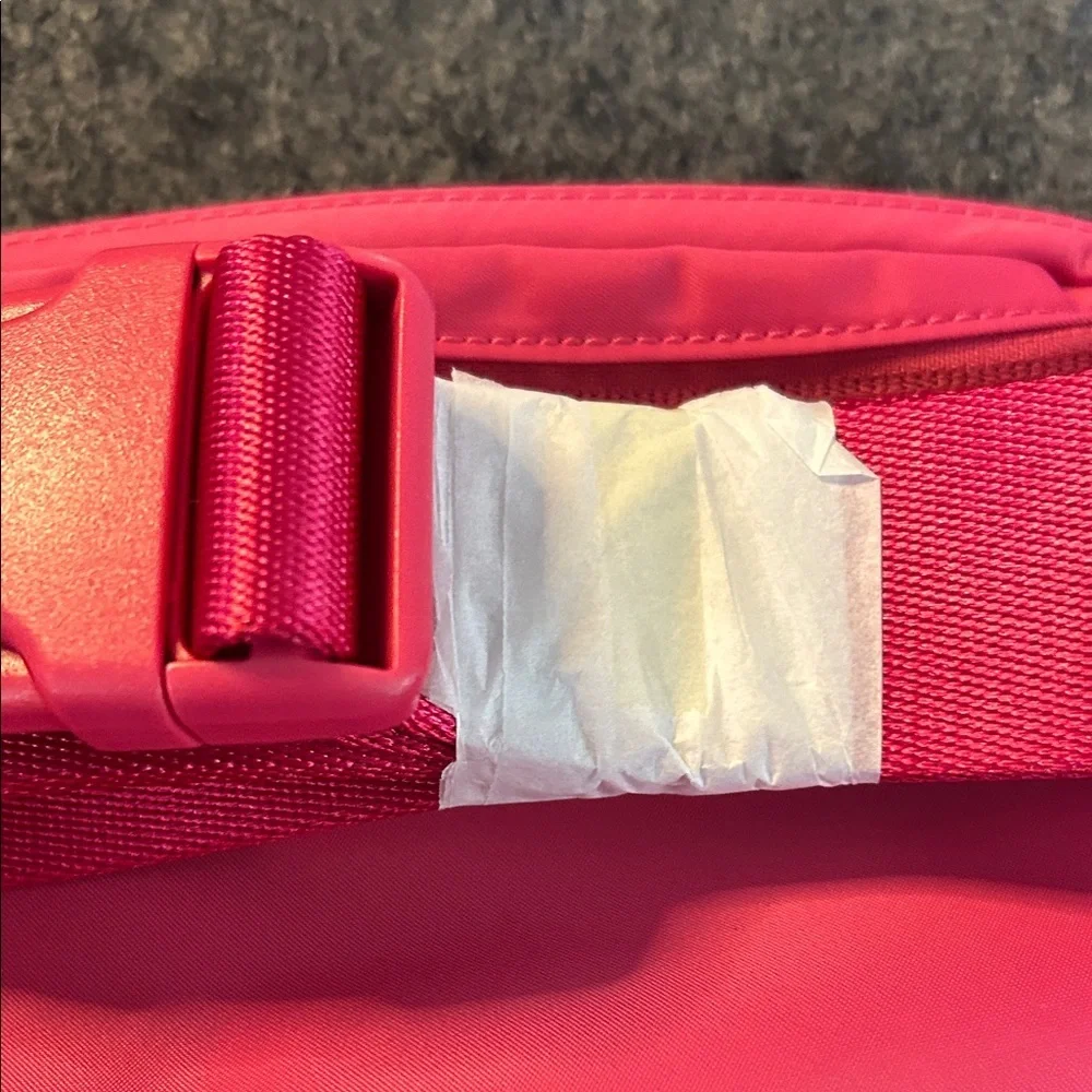 Lululemon Athletica NWT Bright Pink Cosmetic Bag SILVER hardware.